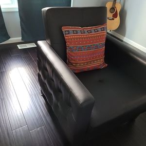 Black faux leather sofa